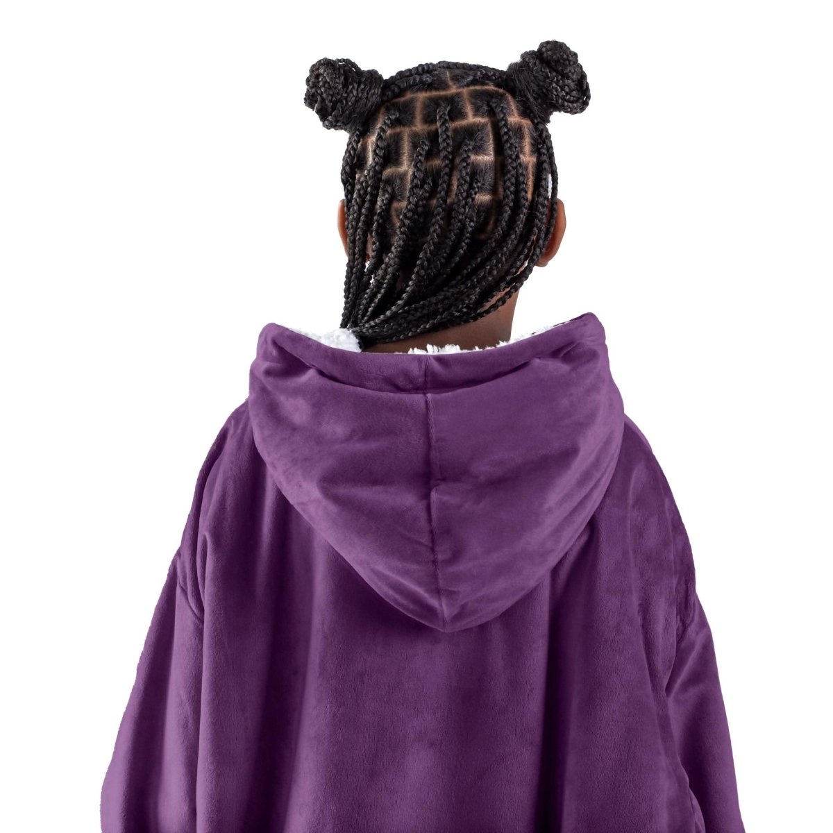 A child with a wearable blanket on