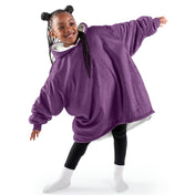 A youth wearable blanket on a child