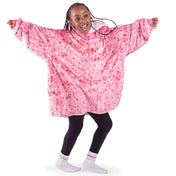 A child wearing a hooded blanket