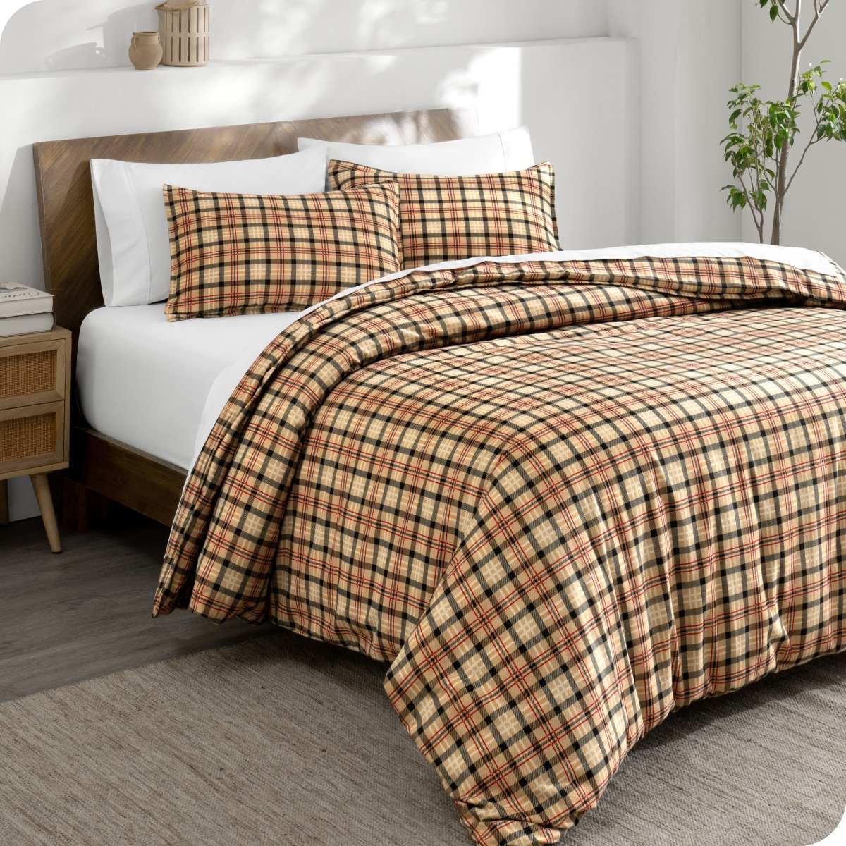 Red lodge plaid duvet cover set on a bed in a bright bedroom