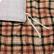 Close-up of the ties on a flannel duvet cover