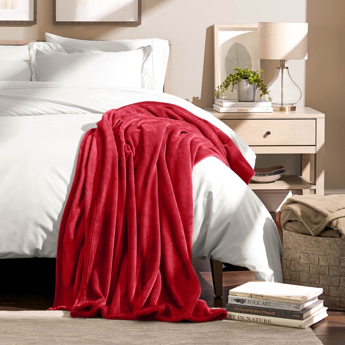 A microplush blanket draped over the corner of a bed