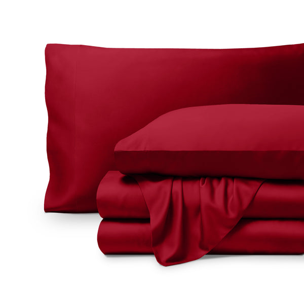 Bamboo pillowcases and sheets set on a white background