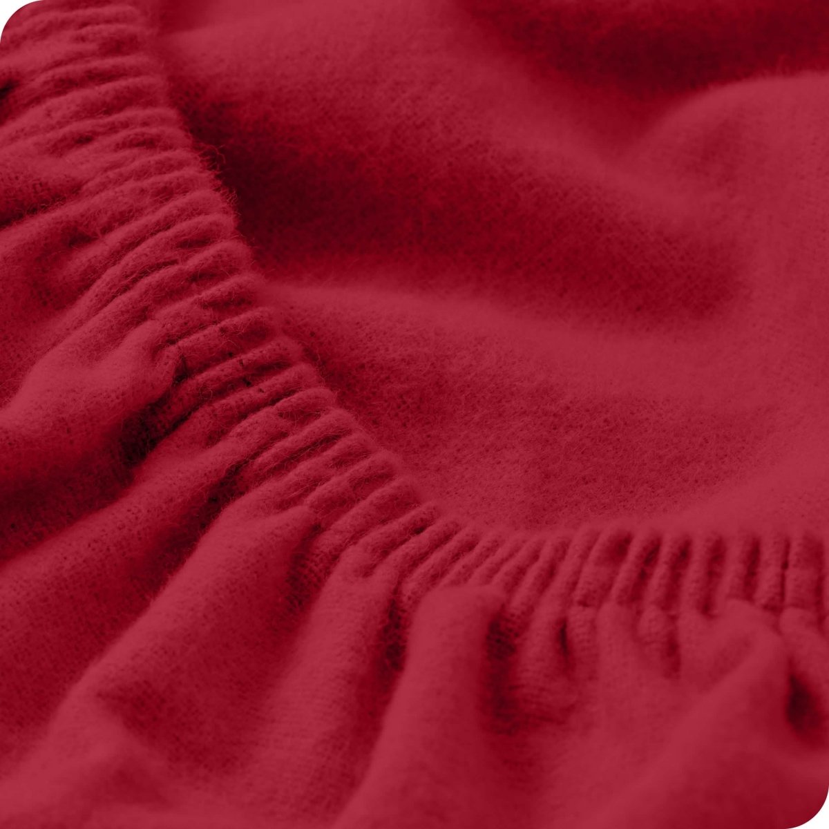 Close up of the elastic portion of a flannel fitted sheet