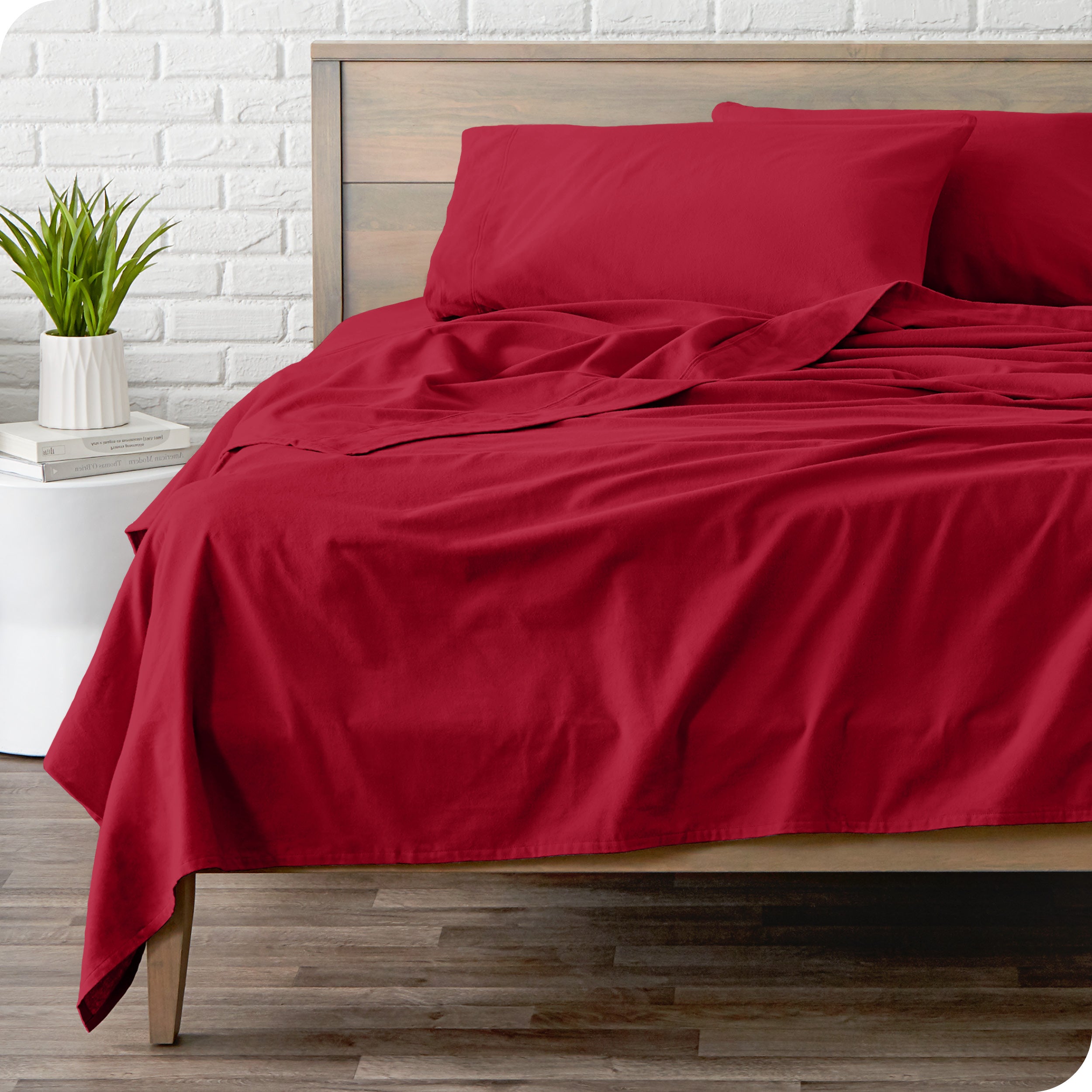 A modern bed with a flannel sheet set on