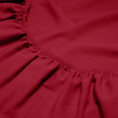 Close-up of a flannel fitted sheet with gathered elastic