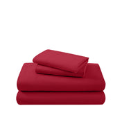 Cotton flannel sheet set folded and stacked on a white background