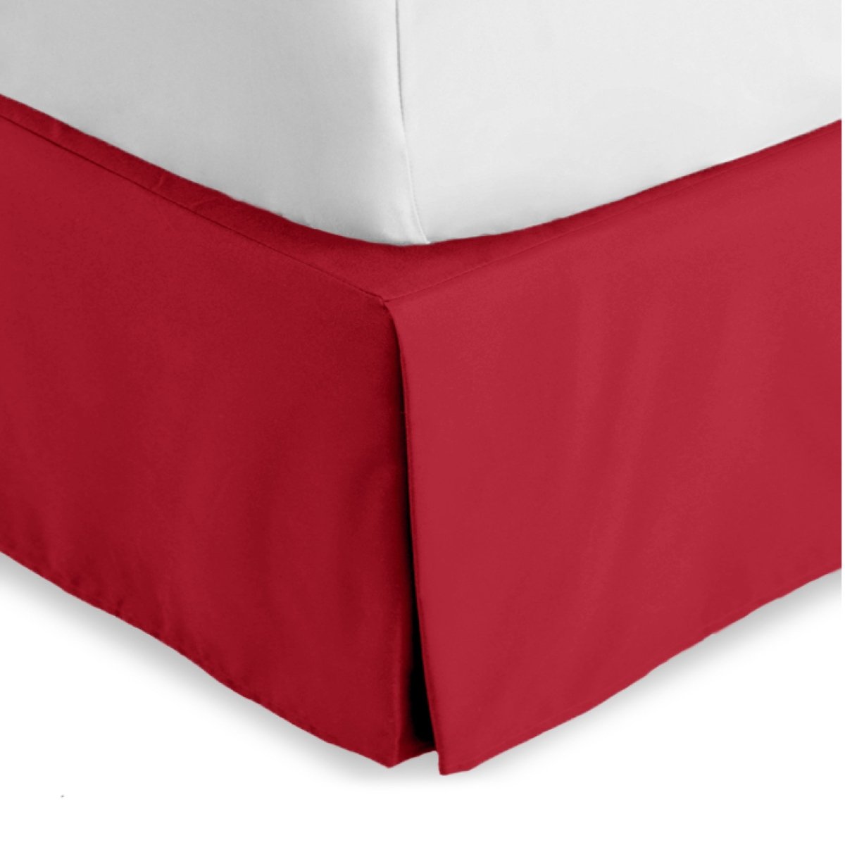 Bed skirt on a bed with white bedding
