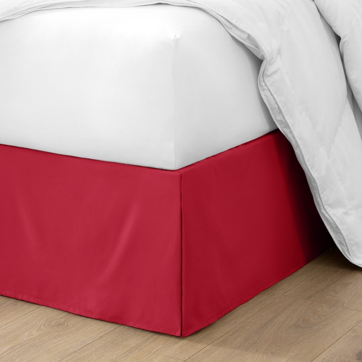 Ultra soft bed skirt on a bed with white bedding.
