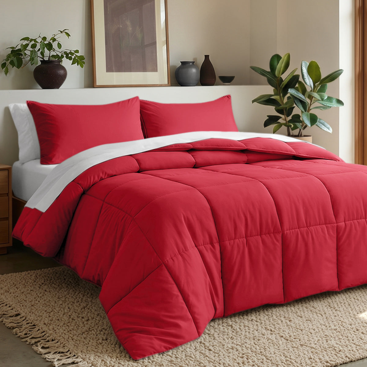 Comforter set on a bed in a bedroom with plants and decor.