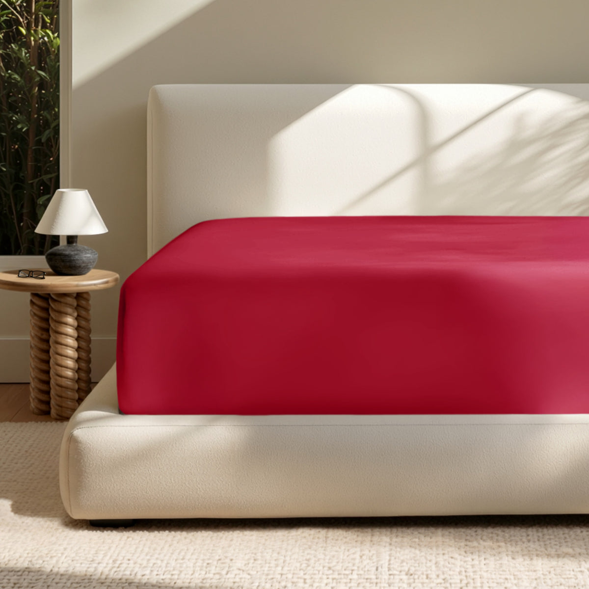 A deep pocket mattress with a fitted sheet on it