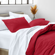 Man sleeping with his head resting on a pillow sham