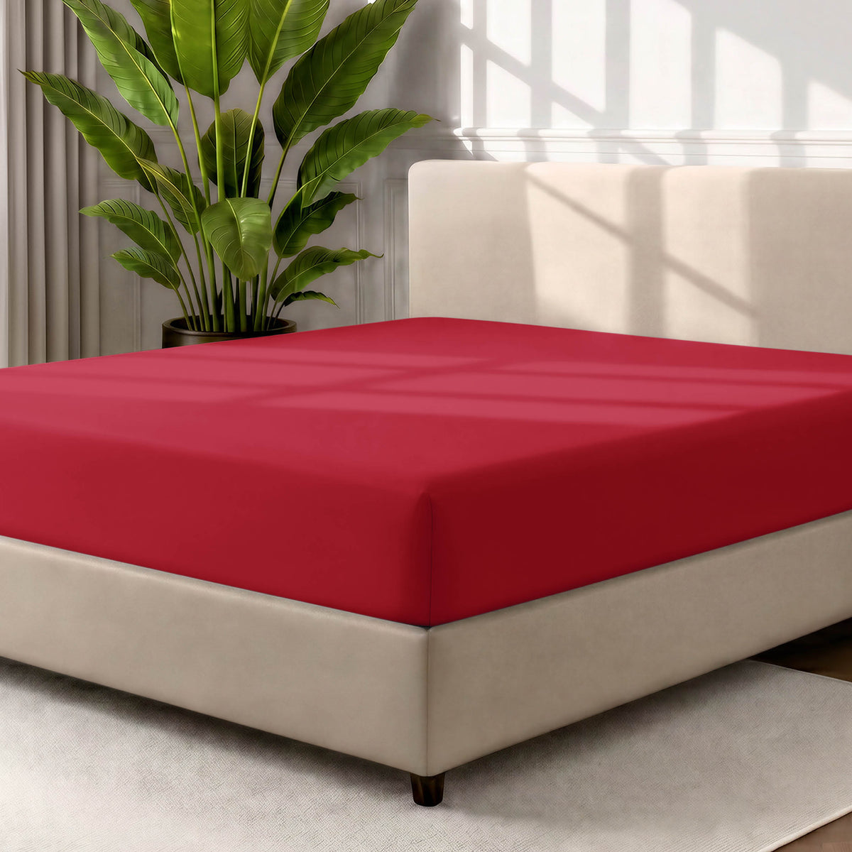 Ultra soft fitted sheet on a mattress with the sun shining into the bedroom