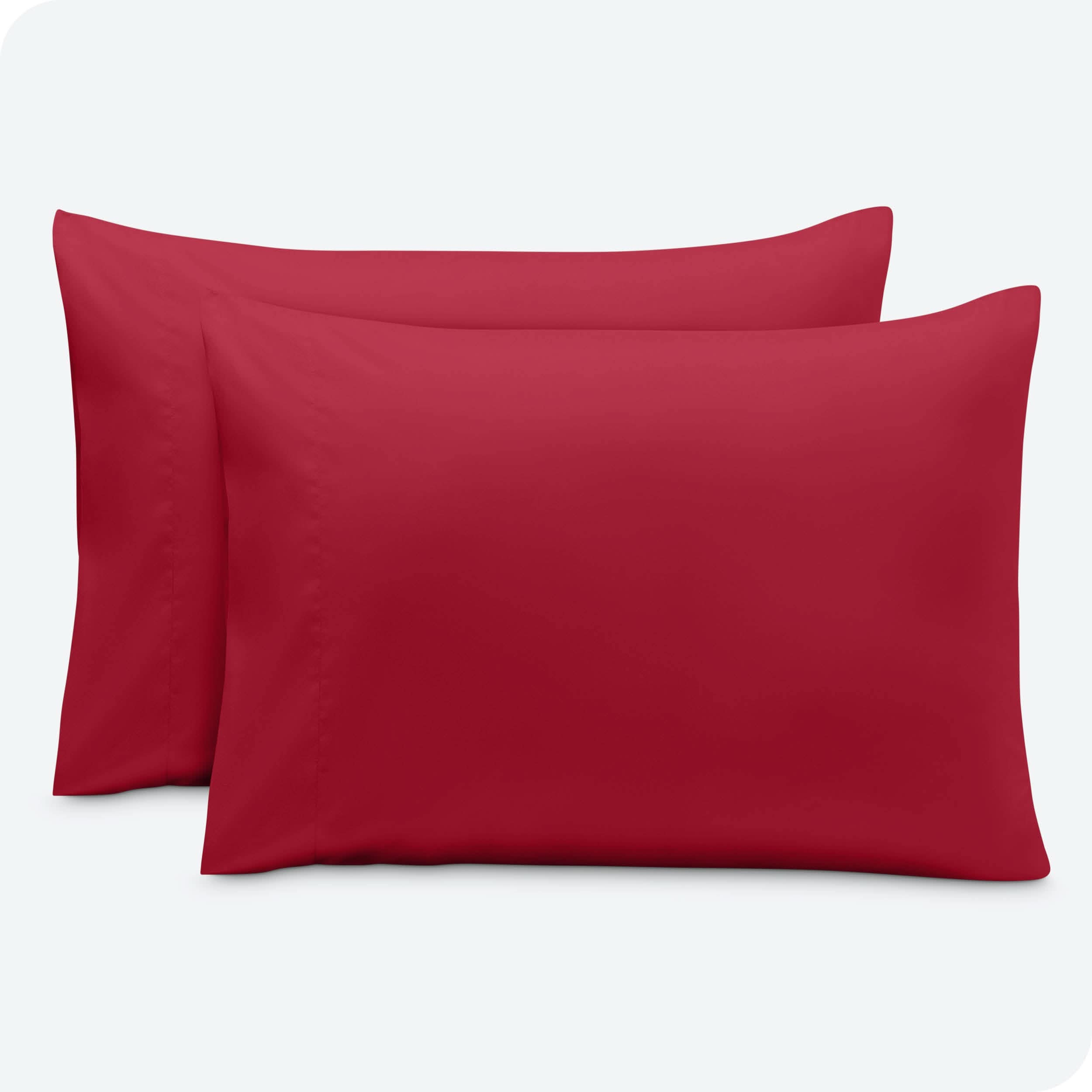 2 pillowcases on pillows