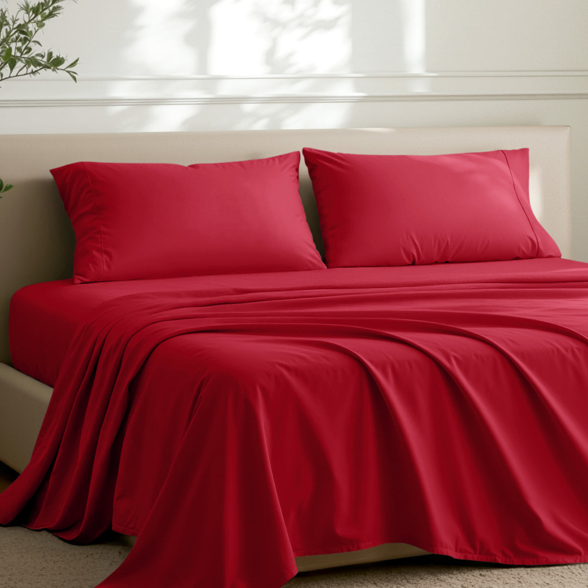 2 pillowcases on pillows on a nicely made bed
