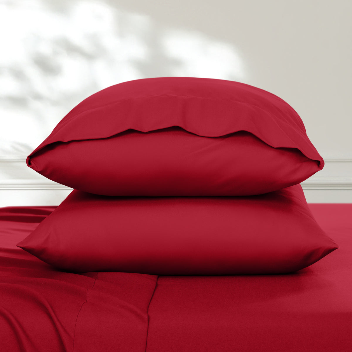 2 pillowcases on pillows