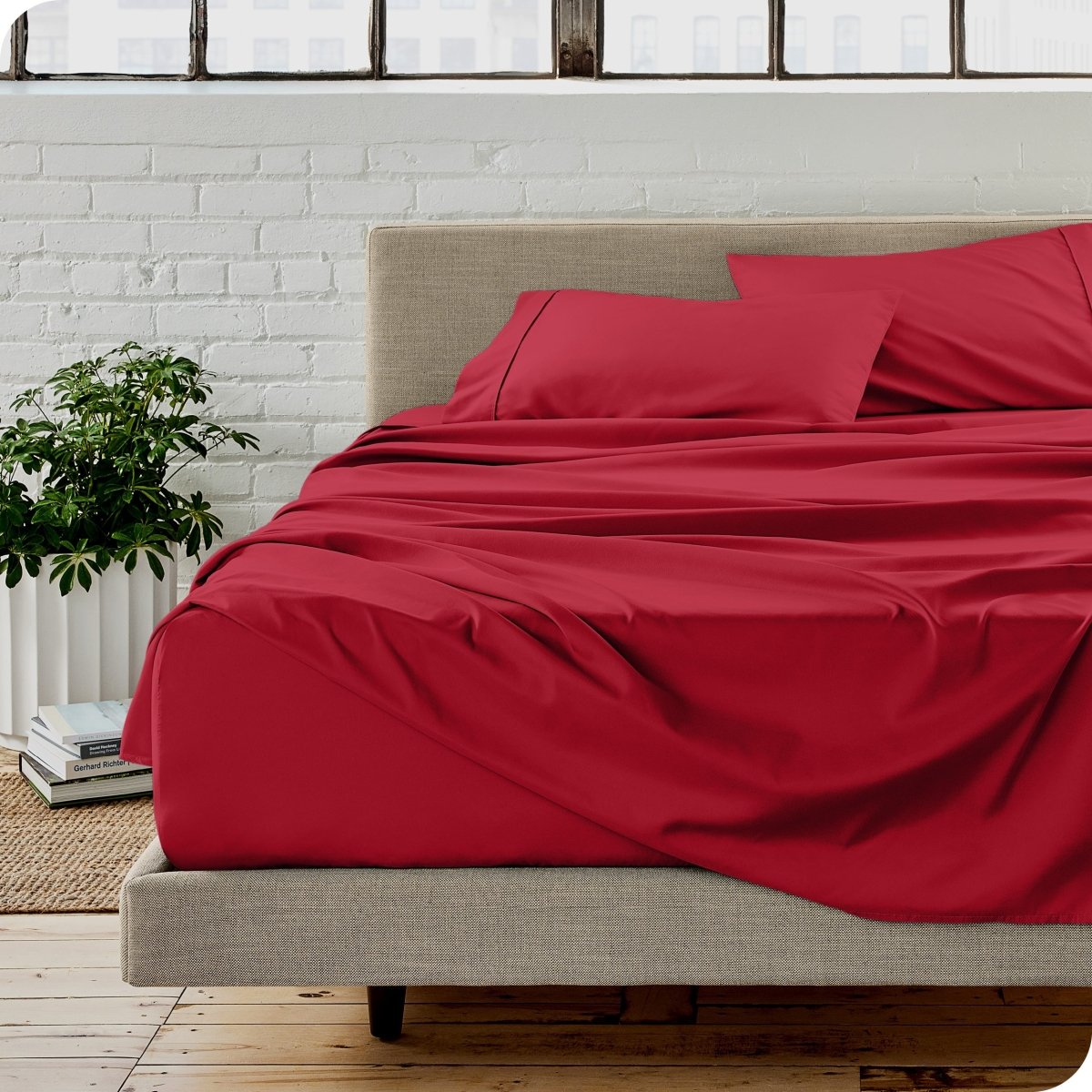 A modern bedroom with microfiber sheets on the mattress