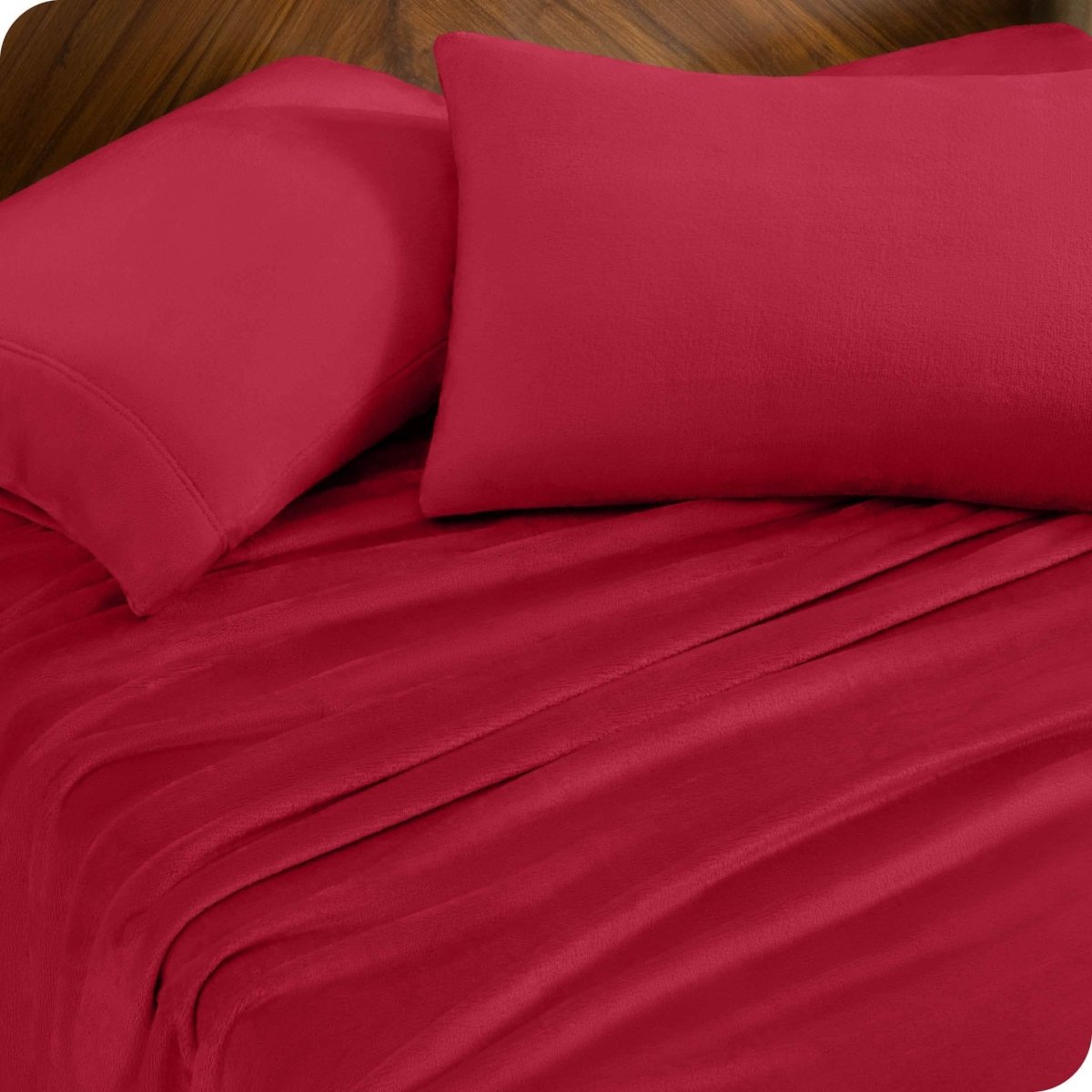 A sheet set and matching pillowcases on a bed.