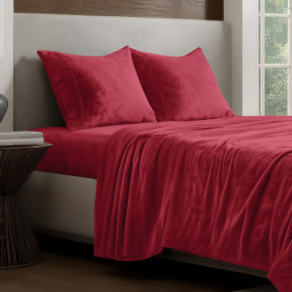 Microplush sheet set on a bed.
