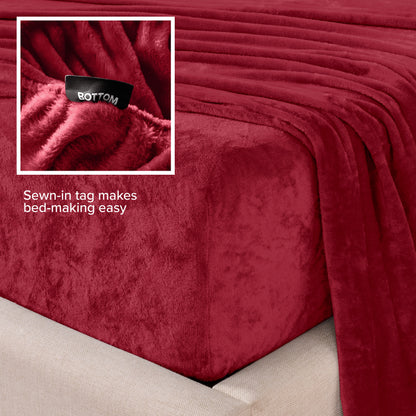 Close-up of the corner of a bed made with microplush sheets