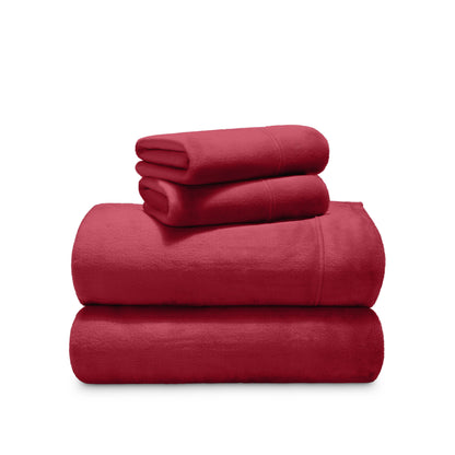 Stack of microplush sheets on a white background