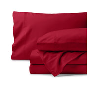Organic flannel bed sheets and pillowcase set on a white background