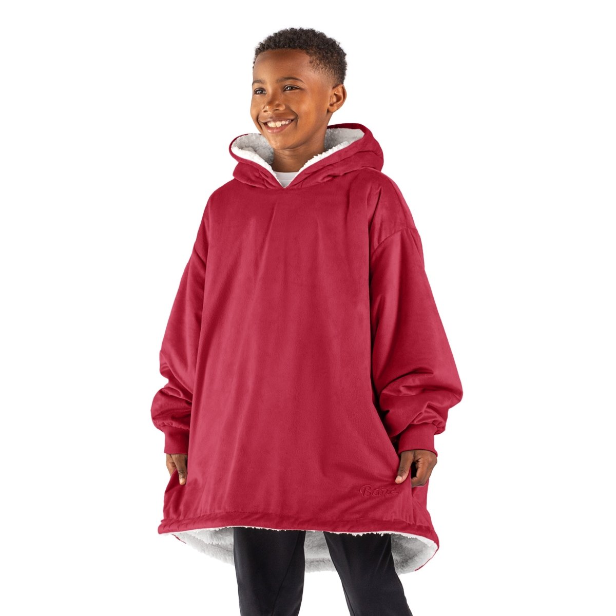 A child with a sherpa wearable blanket on