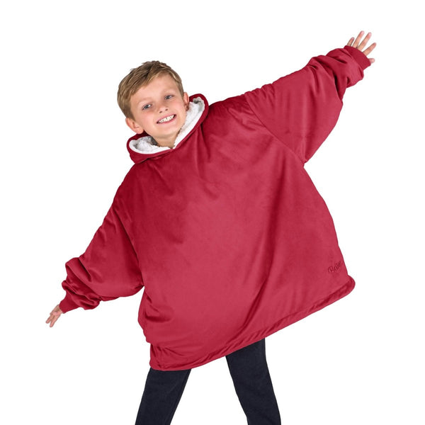 A child with a sherpa wearable blanket on