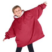 A child with a wearable blanket on