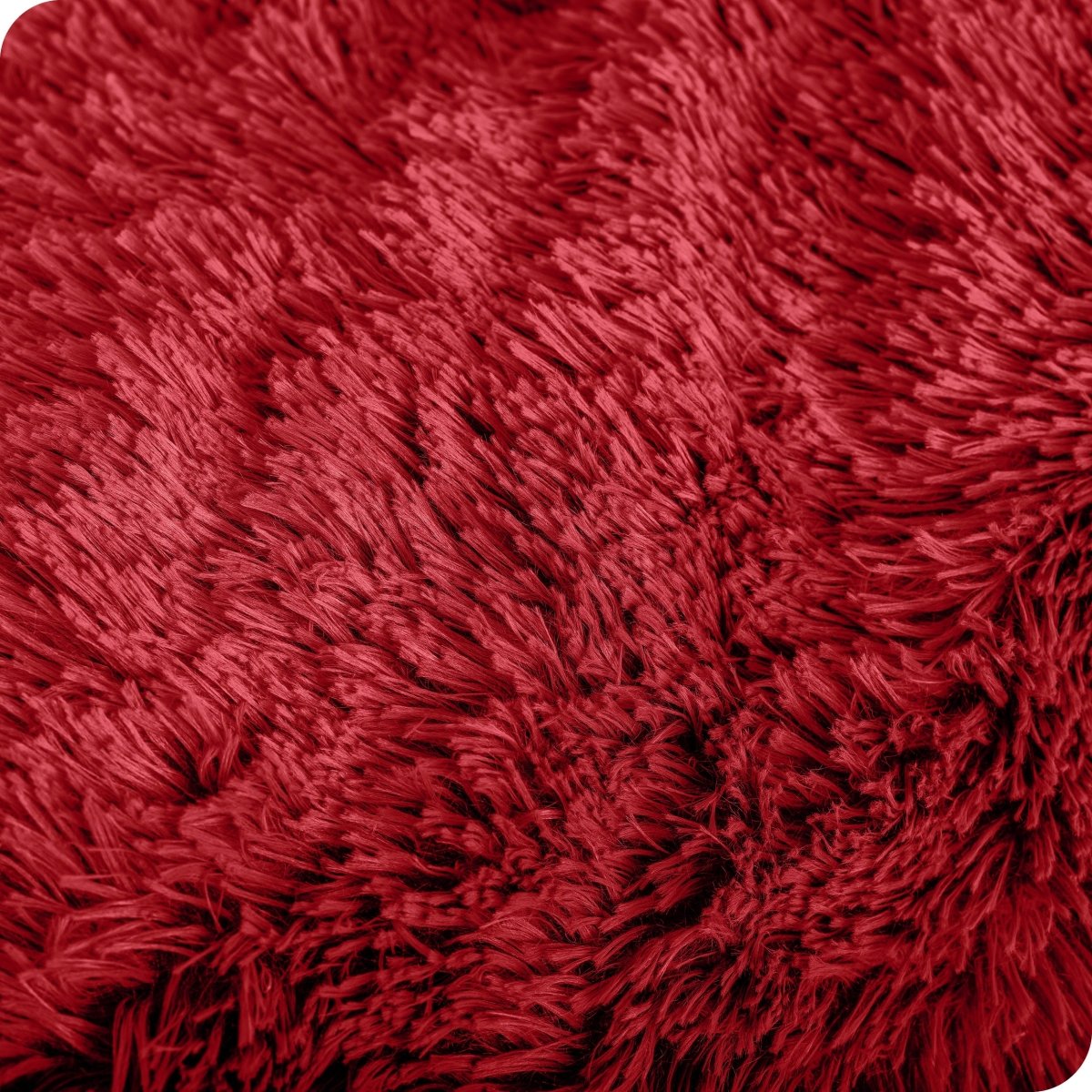 Close up of the soft texture of a shaggy faux fur sherpa blanket