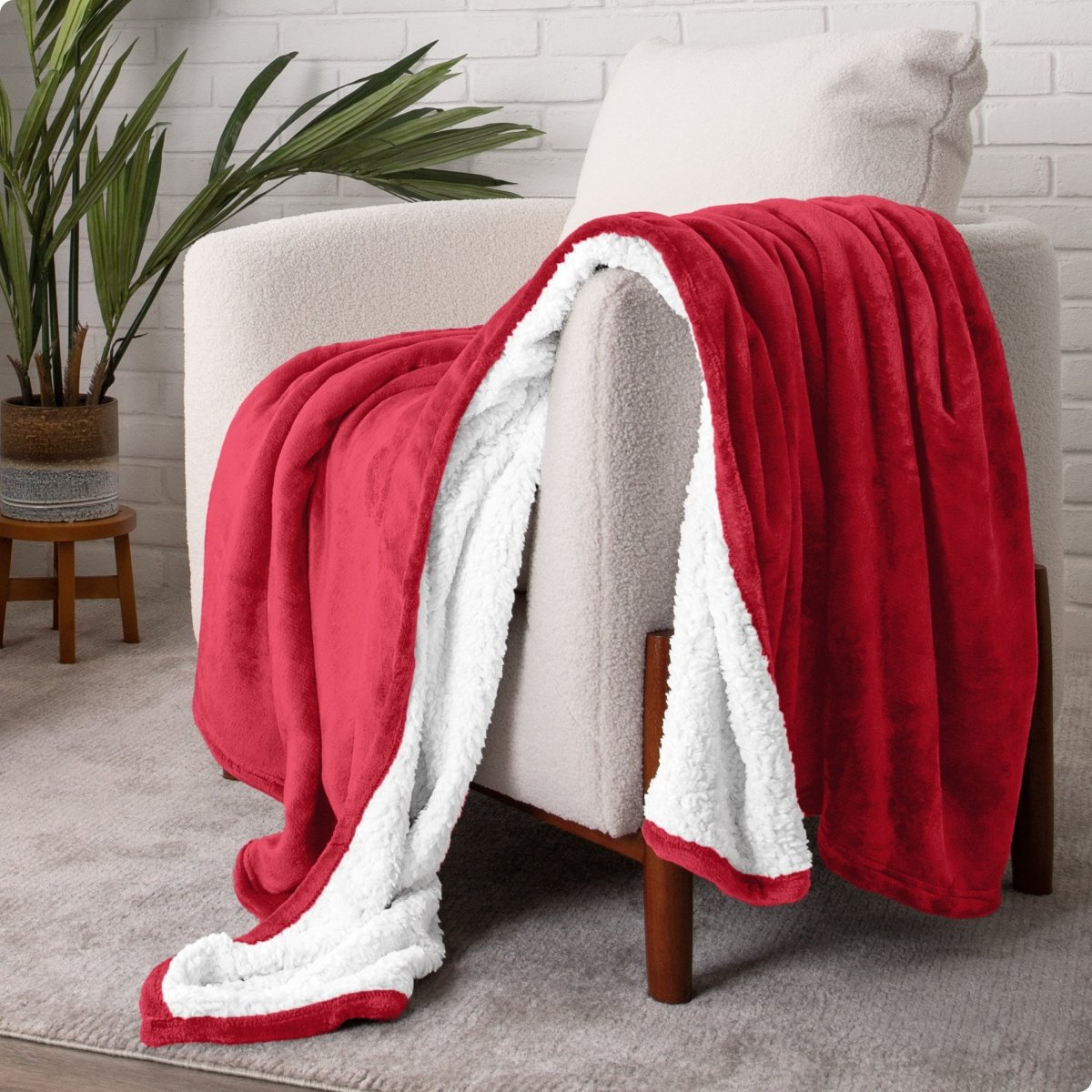 Blanket draped over a chair in a cozy living room setting.