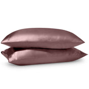 2 satin pillowcases on pillows stacked