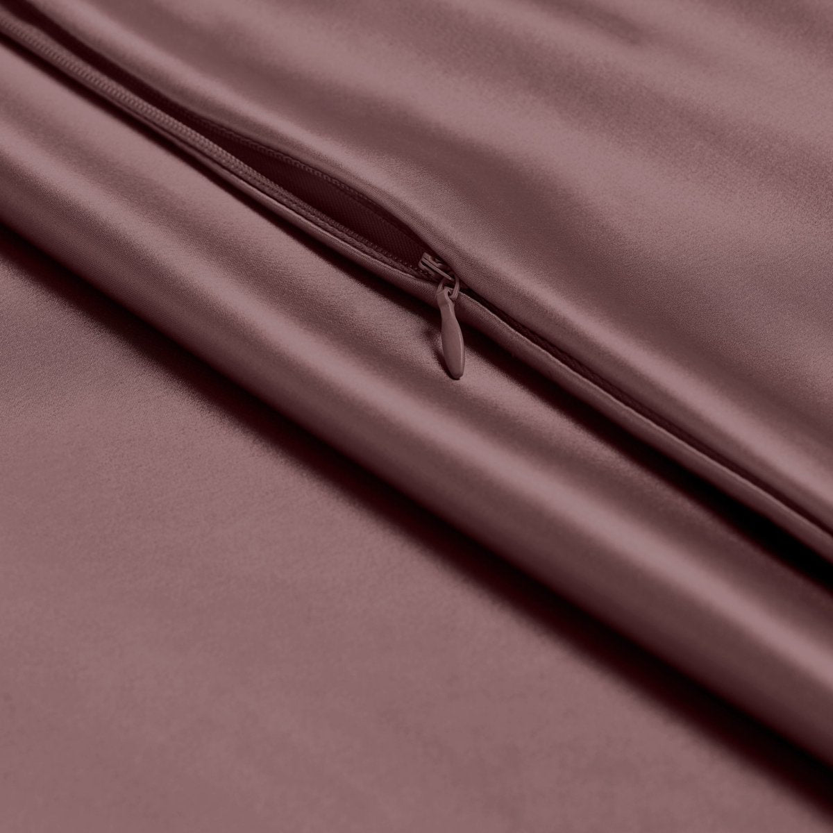 Close-up of poly satin pillowcase with a zipper