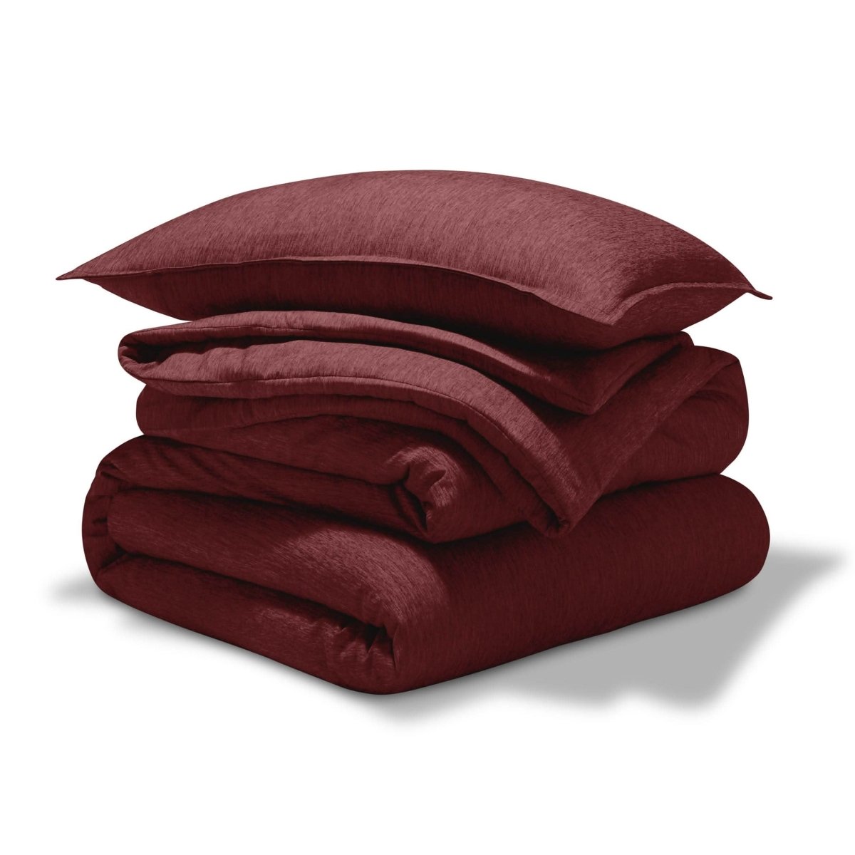A comforter set folded and stacked