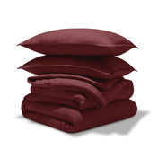A comforter set folded and stacked