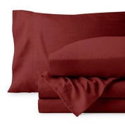 Washed microfiber sheet set folded and stacked on a white background