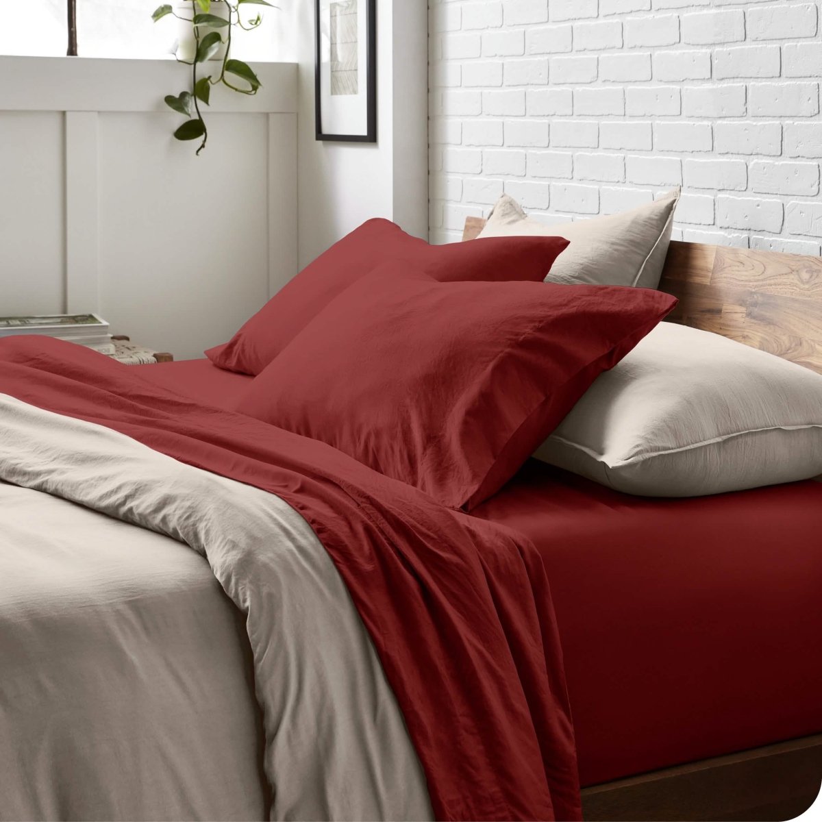 Modern bedroom with washed sheets and duvet cover on a bed