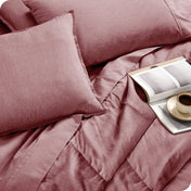 Close up of a bed in a bag set on a mattress
