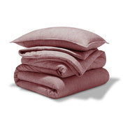 A comforter set folded and stacked