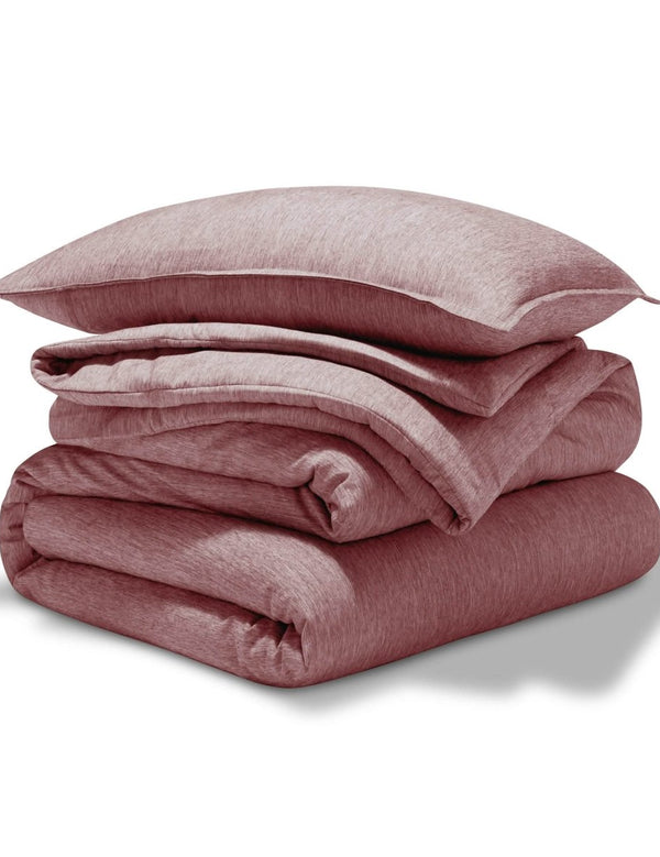 A comforter set folded and stacked