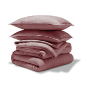 A comforter set folded and stacked