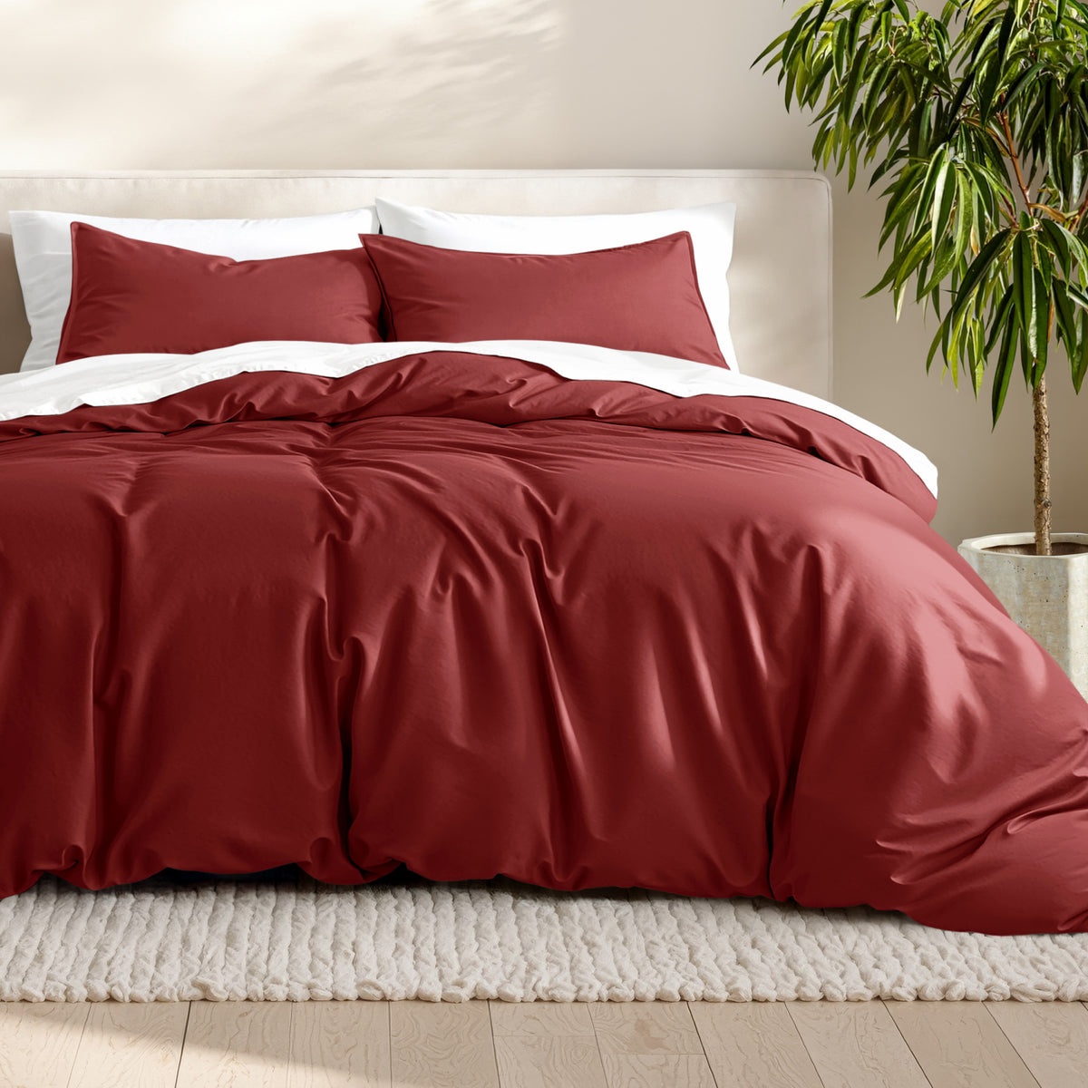 Microfiber bedding set on a bed with a neutral background