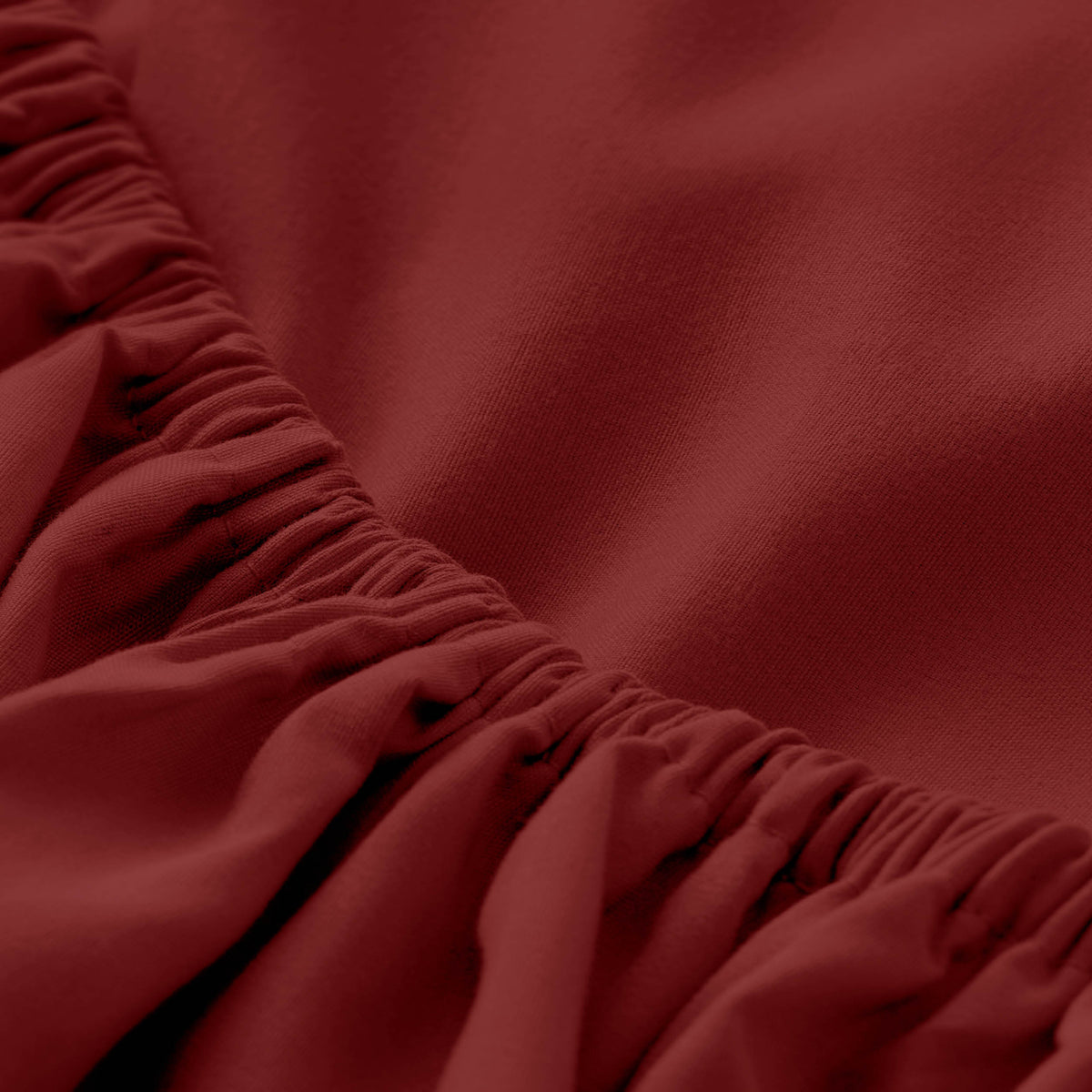 Close-up of fitted sheet with all around elastic