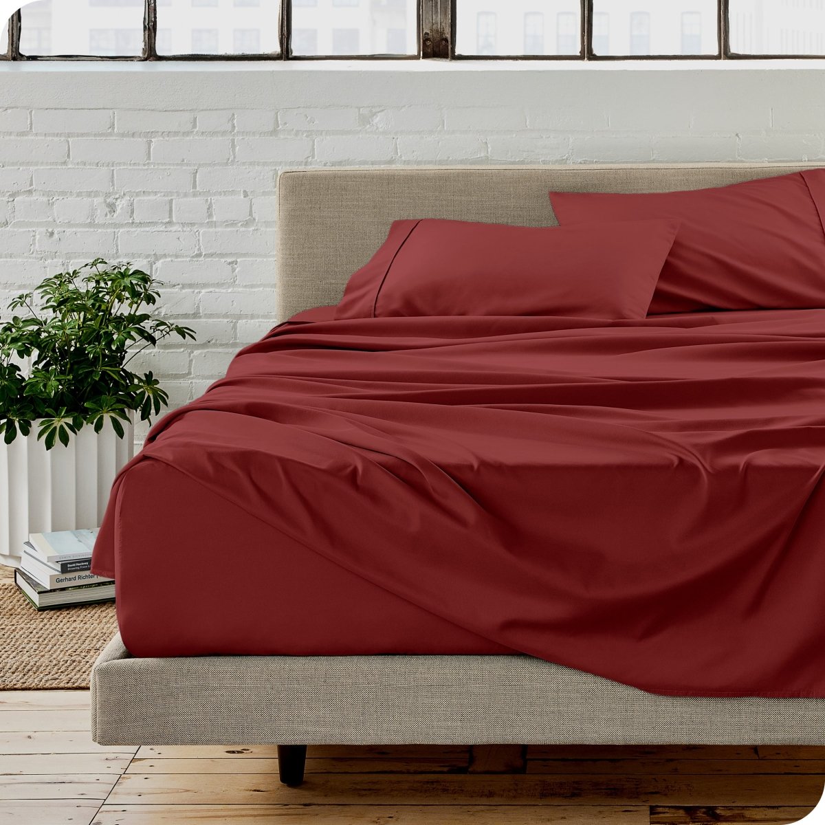 A modern bedroom with microfiber sheets on the mattress
