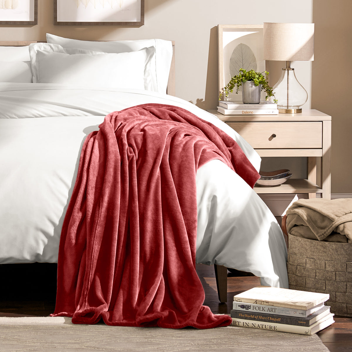 Microplush blanket draped over the corner of a bed