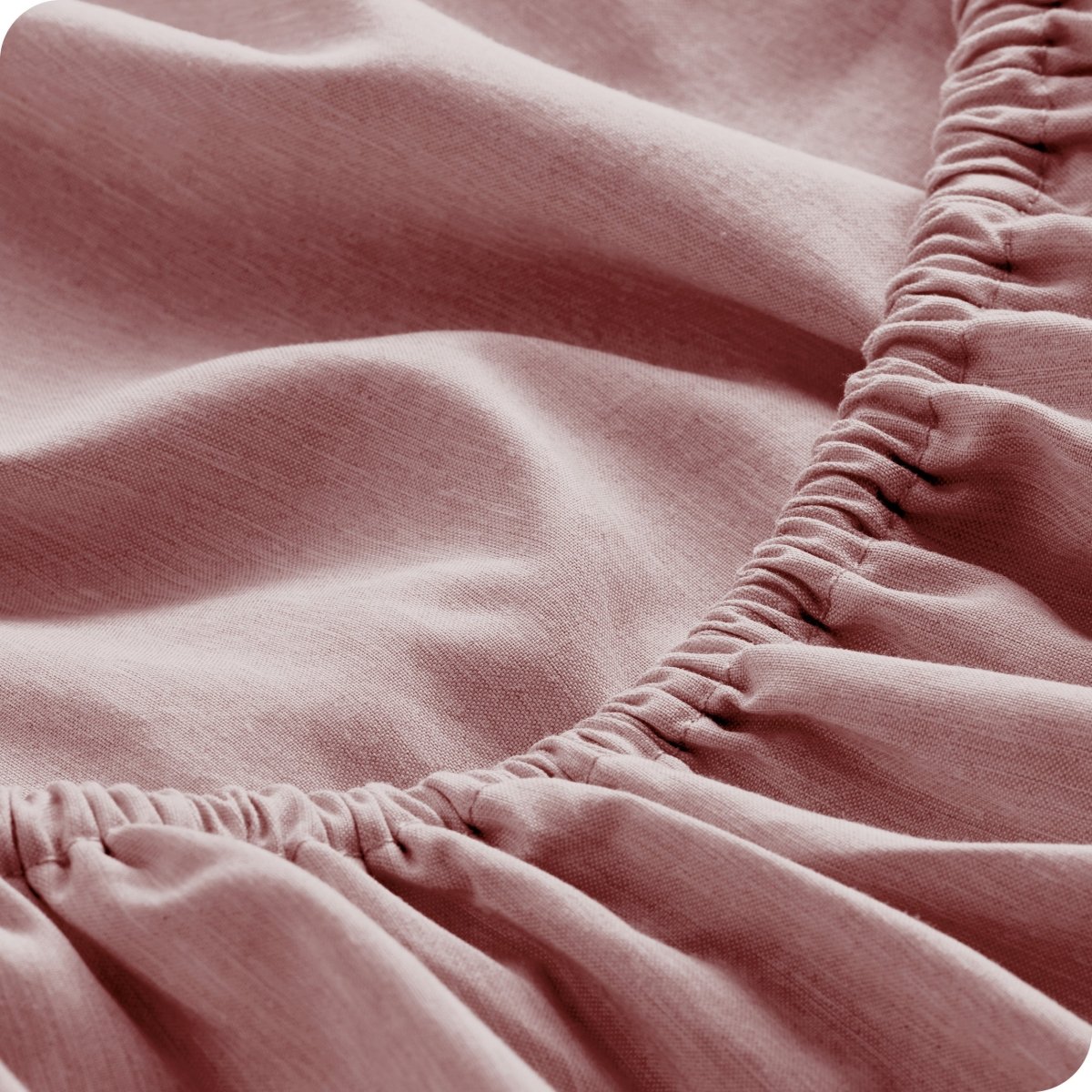 Close-up of fitted sheet with elastic edge