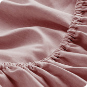 Close-up of fitted sheet with elastic edge