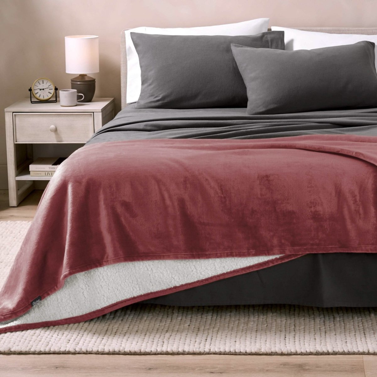 Sherpa blanket on the end of a bed