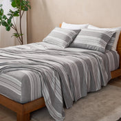 A bed made with microfiber print sheets