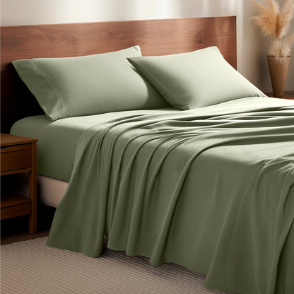 Flannel bedding set on a bed with a wooden headboard and side table